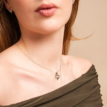 Load image into Gallery viewer, Paw Prints Heart Pendant with Topaz, Sterling Silver & Welsh Gold