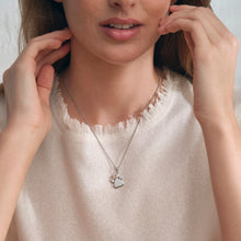 Load image into Gallery viewer, Paw Prints Pendant with Topaz, Sterling Silver &amp; Welsh Gold
