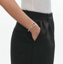Load image into Gallery viewer, Mercy Twist Bangle Medium, Sterling Silver
