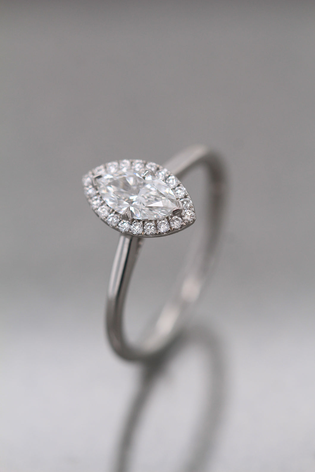 Platinum, 0.52ct F Vs2 Marquise Cluster Diamond Ring
