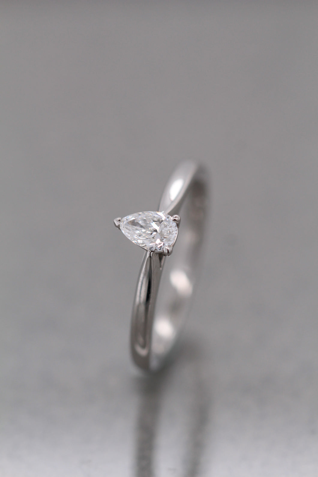 Platinum, 0.30ct F Si1 Pear-Shaped Diamond Ring